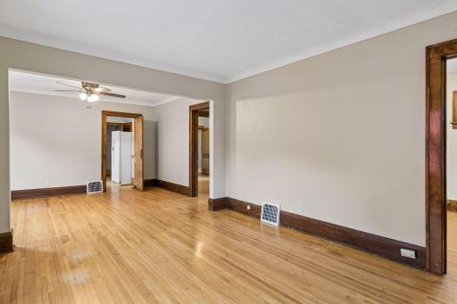 View of dining room and door to kitchen and to the right bath and another bedroom