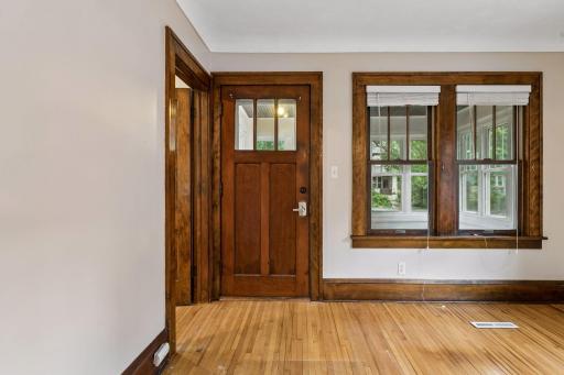 Great natural light - door out to porch and to the left is front bedroom