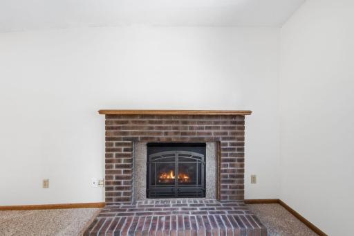 Living room with gas fireplace.