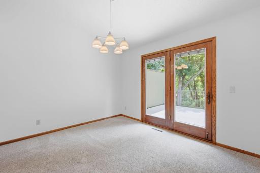 Dining room walks out to the no maintenance deck.