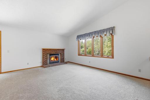 Living room with gas fireplace.