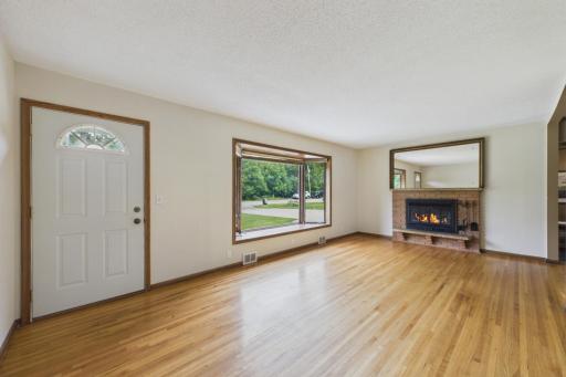 Original Hardwood Floors and Wood Burning Fireplace