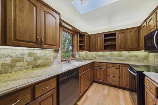 Granite Kitchen Countertops, SS Appliances, Pull Out Cabinet Drawers