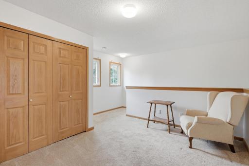 The upper floor offers a bonus loft area with bi-fold door to the laundry closet.