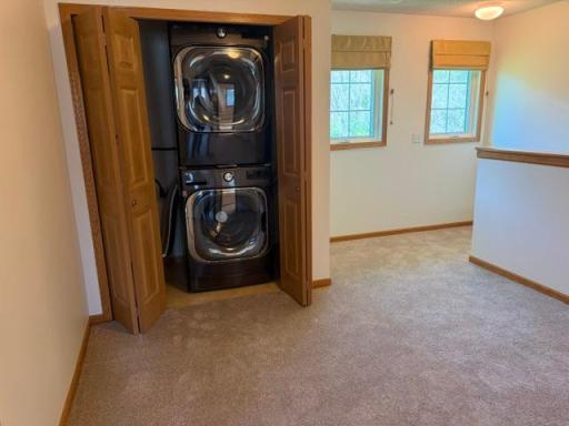 Second floor Laundry closet with additional storage space.