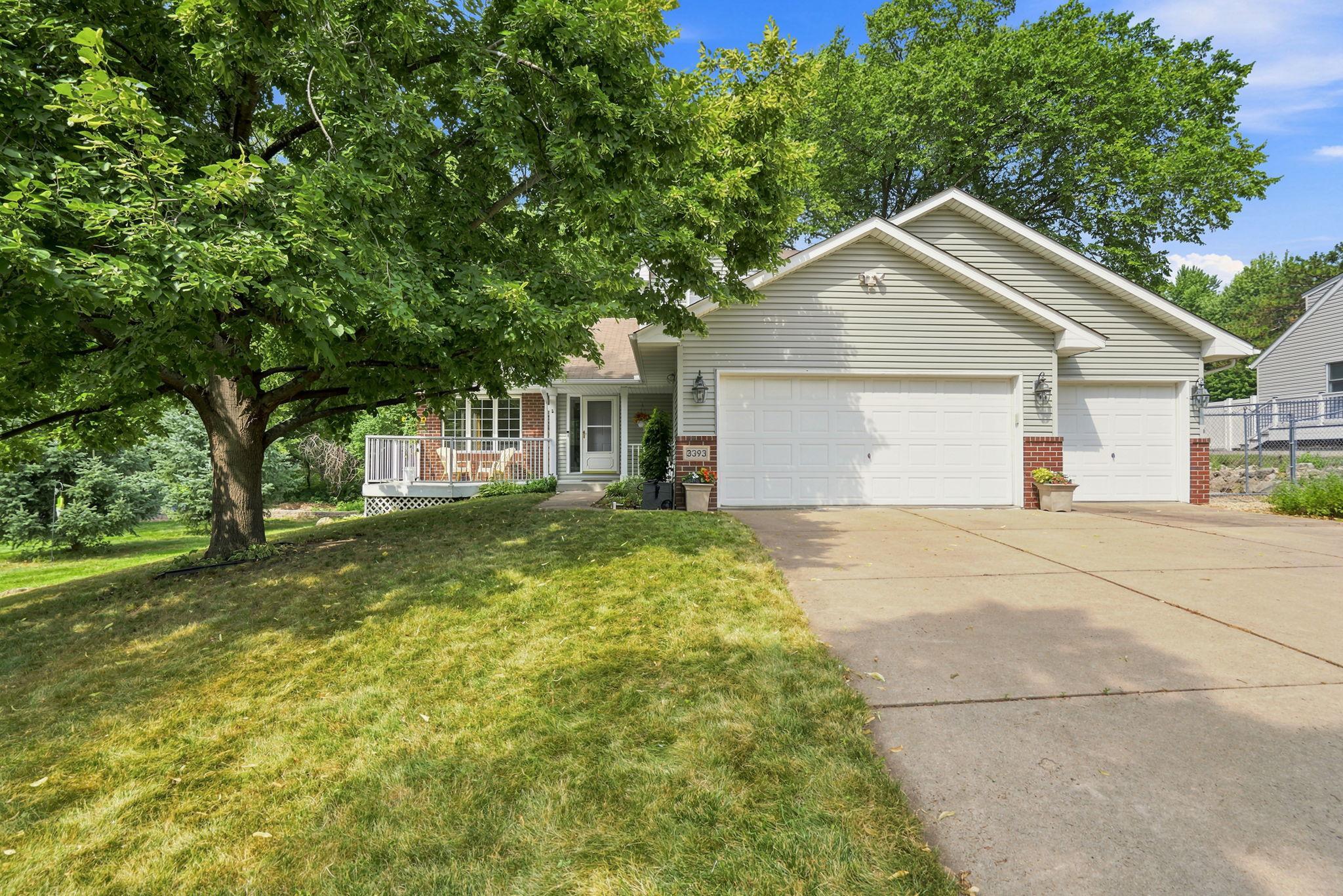 Cement driveway and maintenance free exterior.