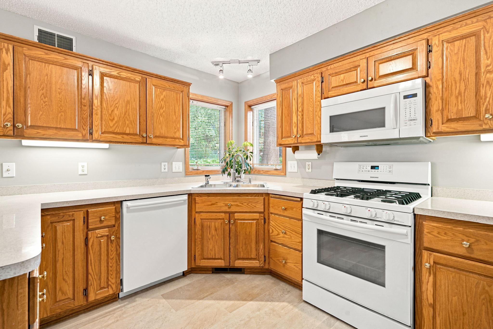 Corner window above sink.