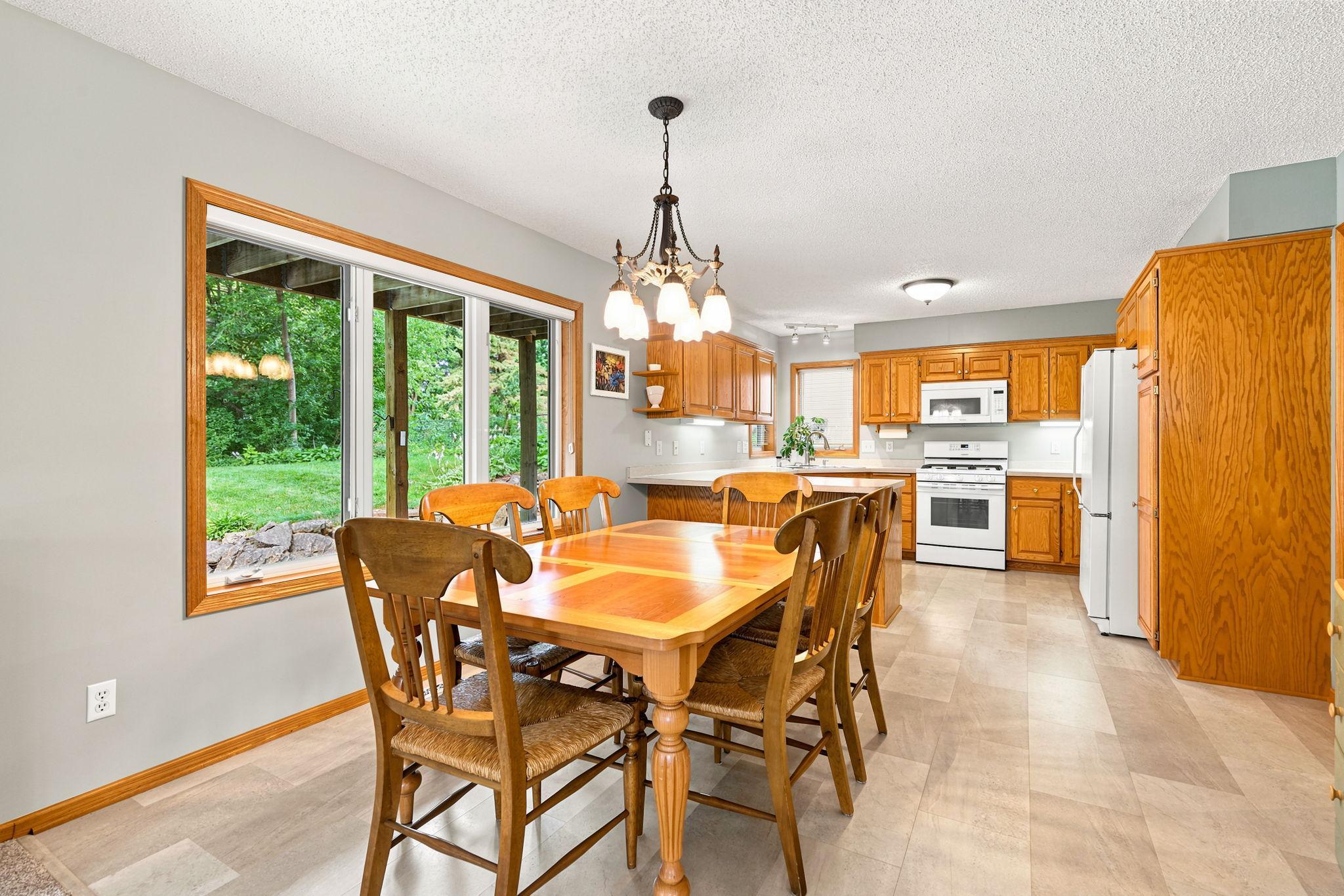 Dining area with nice window viewing the private back yard.
