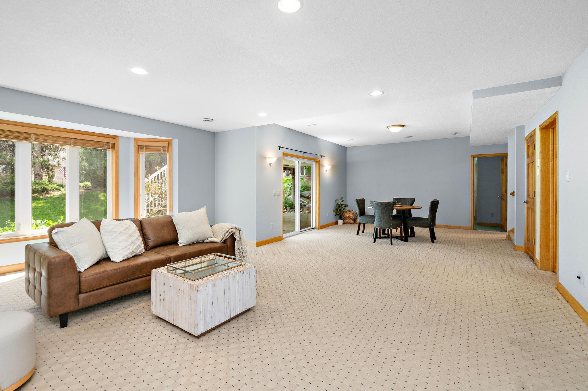 Open and spacious! Walks out to private backyard