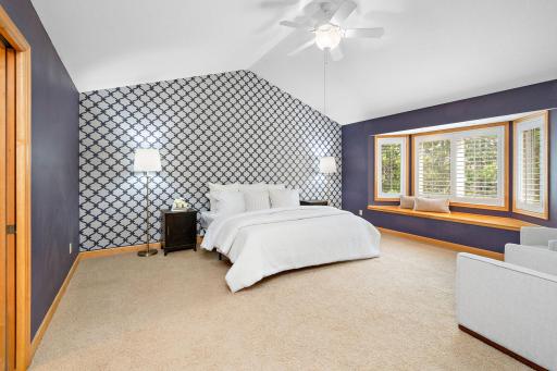 Spacious Primary suite with double doors and sitting area