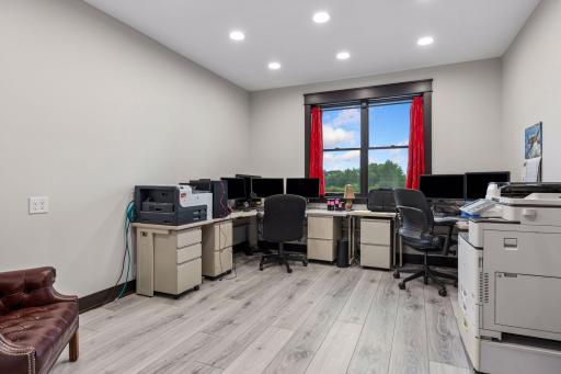 West facing office with ample outlets (many at desk height), sound proofing and LVP flooring.