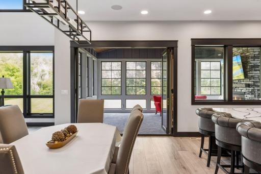 From the dining room you can access the 3-season porch which has an accordion door that opens to 9 ft. 