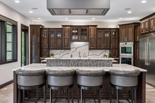 This island has pot and pan drawers, pot and pan pull outs, spice drawer, pull-outs for paper towels, knifes etc. 