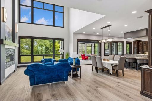 A view of your living room, kitchen, and 3-season porch!