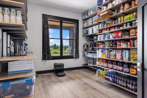Between the dining room and kitchen there is access to a pantry/mudroom. 