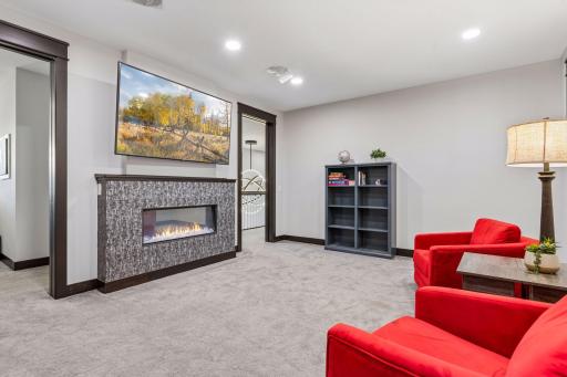 The family room features an electric fireplace