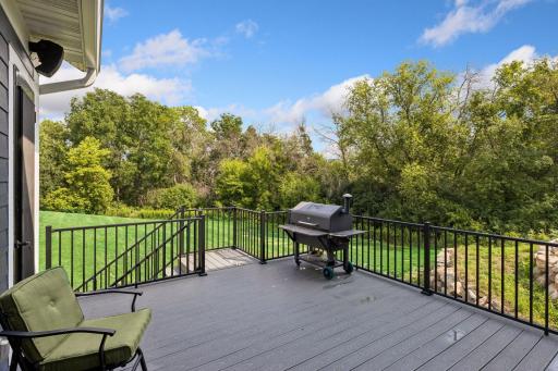 Your maintenance free deck off the kitchen and 3 season porch!