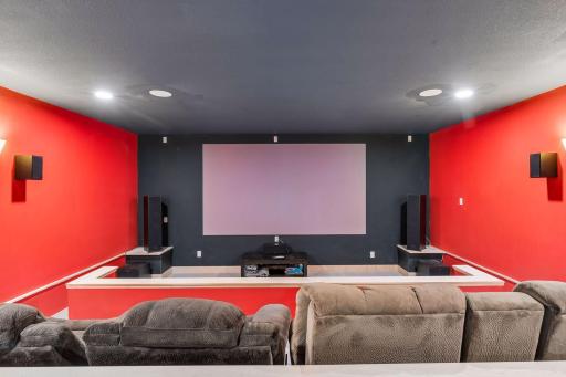 The screen is painted with a specific paint for this purpose.  Theater is set up for a 9.2.4 setup with Denon Amp powering Klipsch speakers and LG 4k projector.