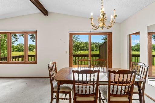 Open floor plan and with access to the spacious deck through the new Andersen patio door.