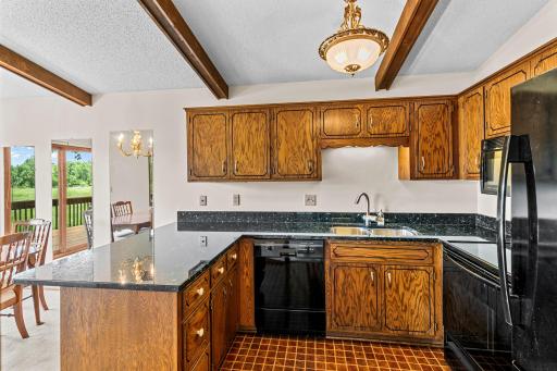 Granite breakfast bar and informal dining.
