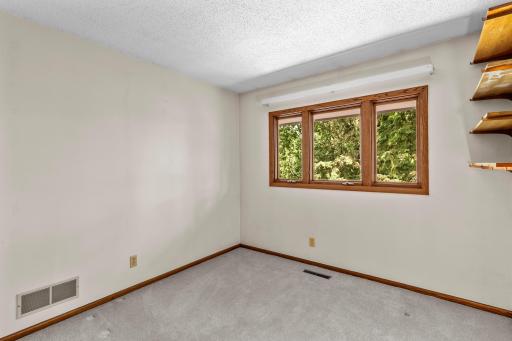 2nd bedroom on the upper level. Updated windows.