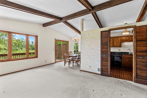 An open floor plan. New Andersen patio door and window.