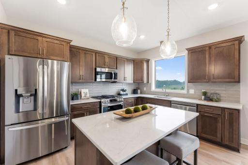 Quartz countertops with tile backsplash