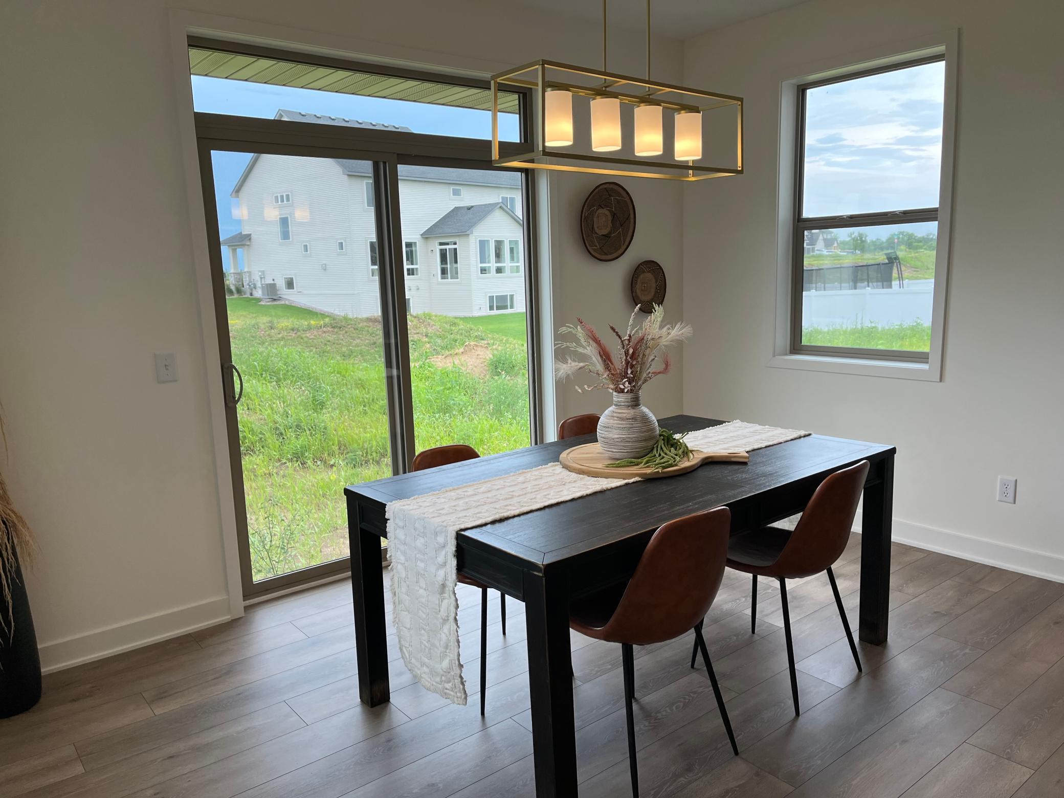 Dining area with sliding glass door to future deck or patio