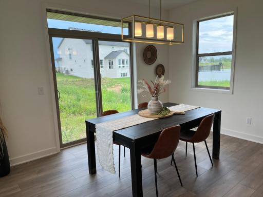 Dining area with sliding glass door to future deck or patio