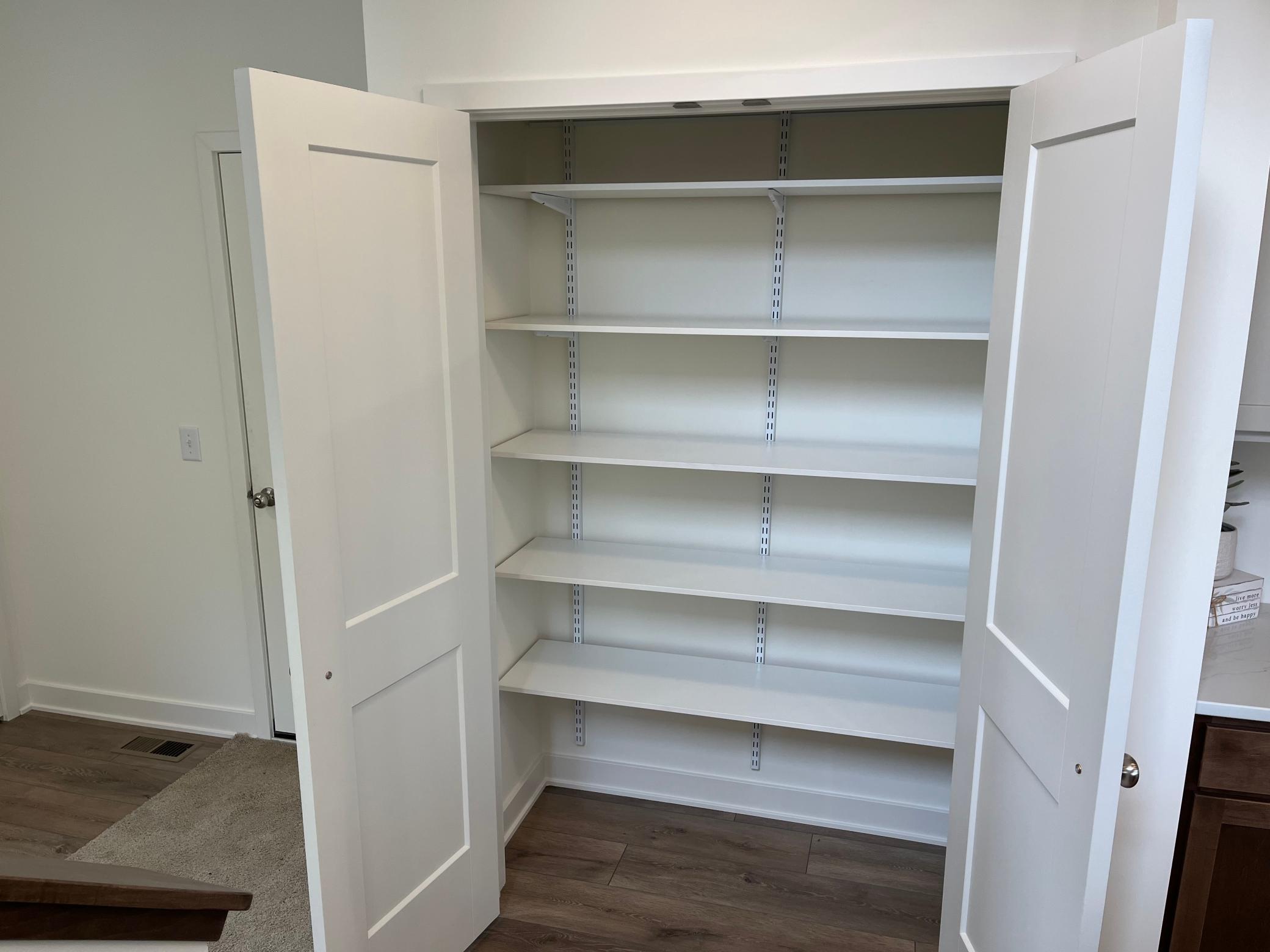 Pantry right between mudroom and kitchen. Convenient for putting away groceries.