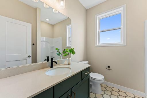 Main level bathroom with shower