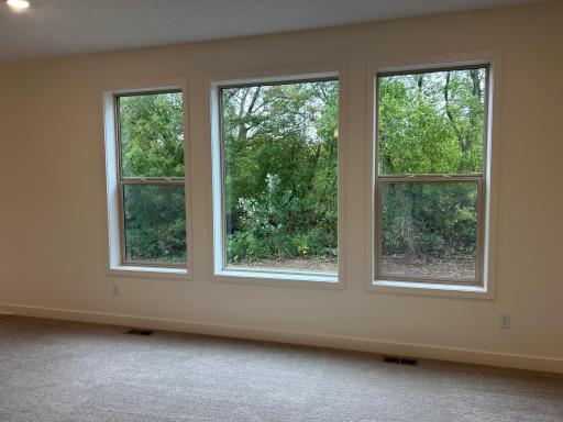 Oversized windows in family room for natural light