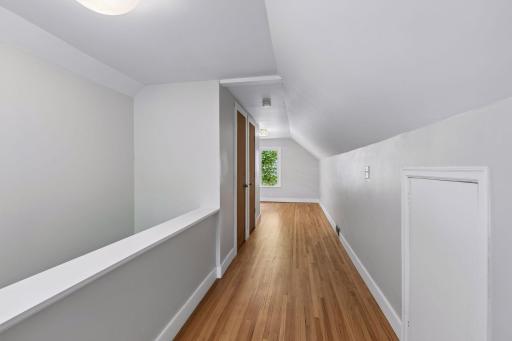 The upper level has hardwood floors with windows on two sides for lots of light
