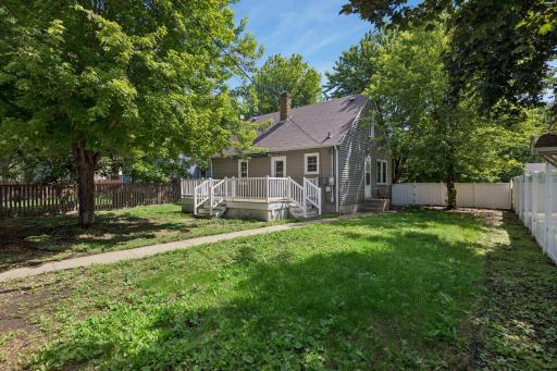 The level fenced in backyard is ideal for kids and pets with lots of space to play