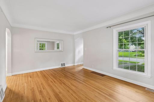 There is a large east facing picture window overlooking the front yard