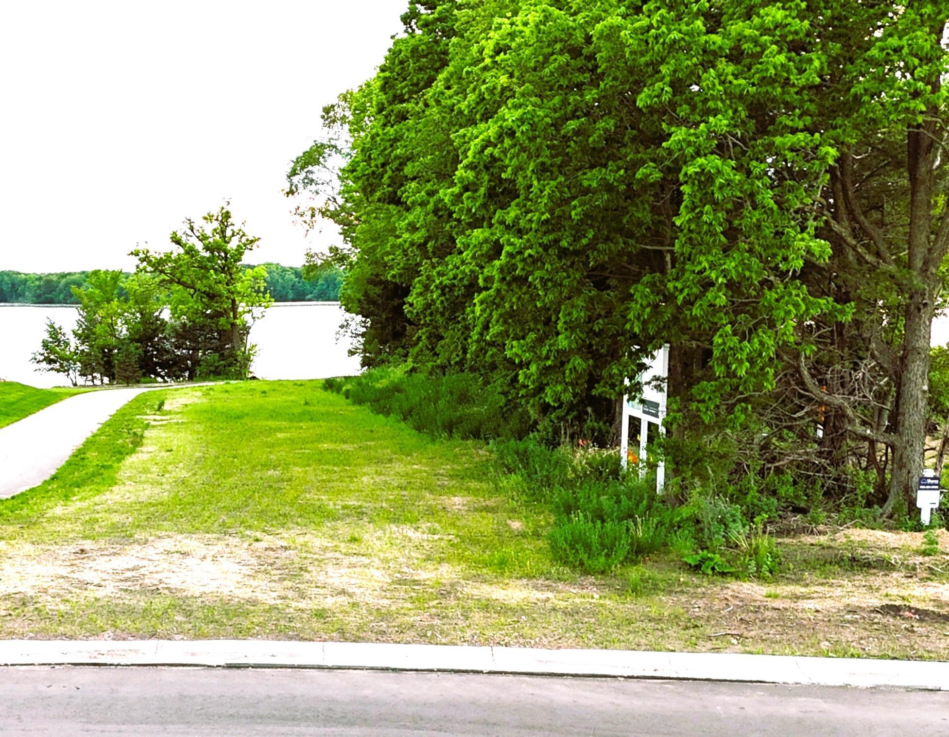 Enjoy the lakeside green space and its 30' of lake frontage.