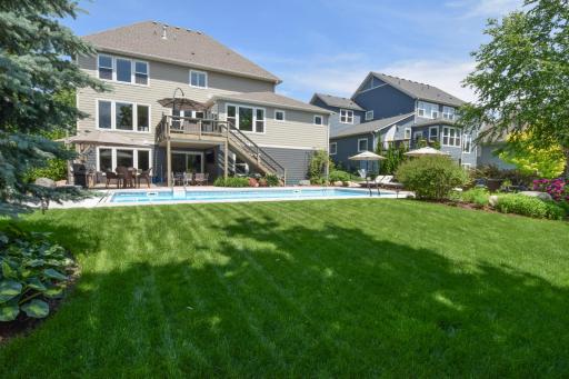 Completely fenced with magnificent professional landscaping