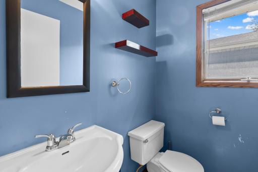 Main level 1/2 bath is perfect for guests.