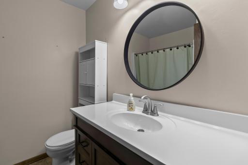 Main level full bath services the secondary bedrooms.