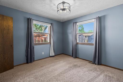 Main level secondary bedroom.