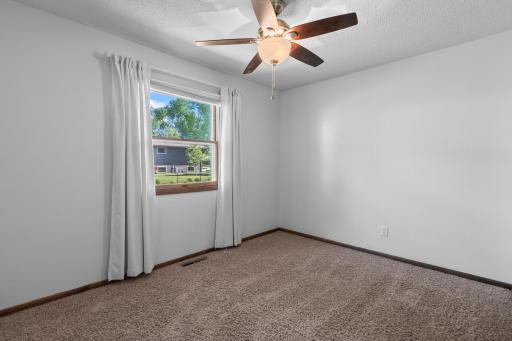 Main level secondary bedroom.