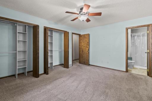 Notice the double closets with closet systems for maximium storage efficiency.