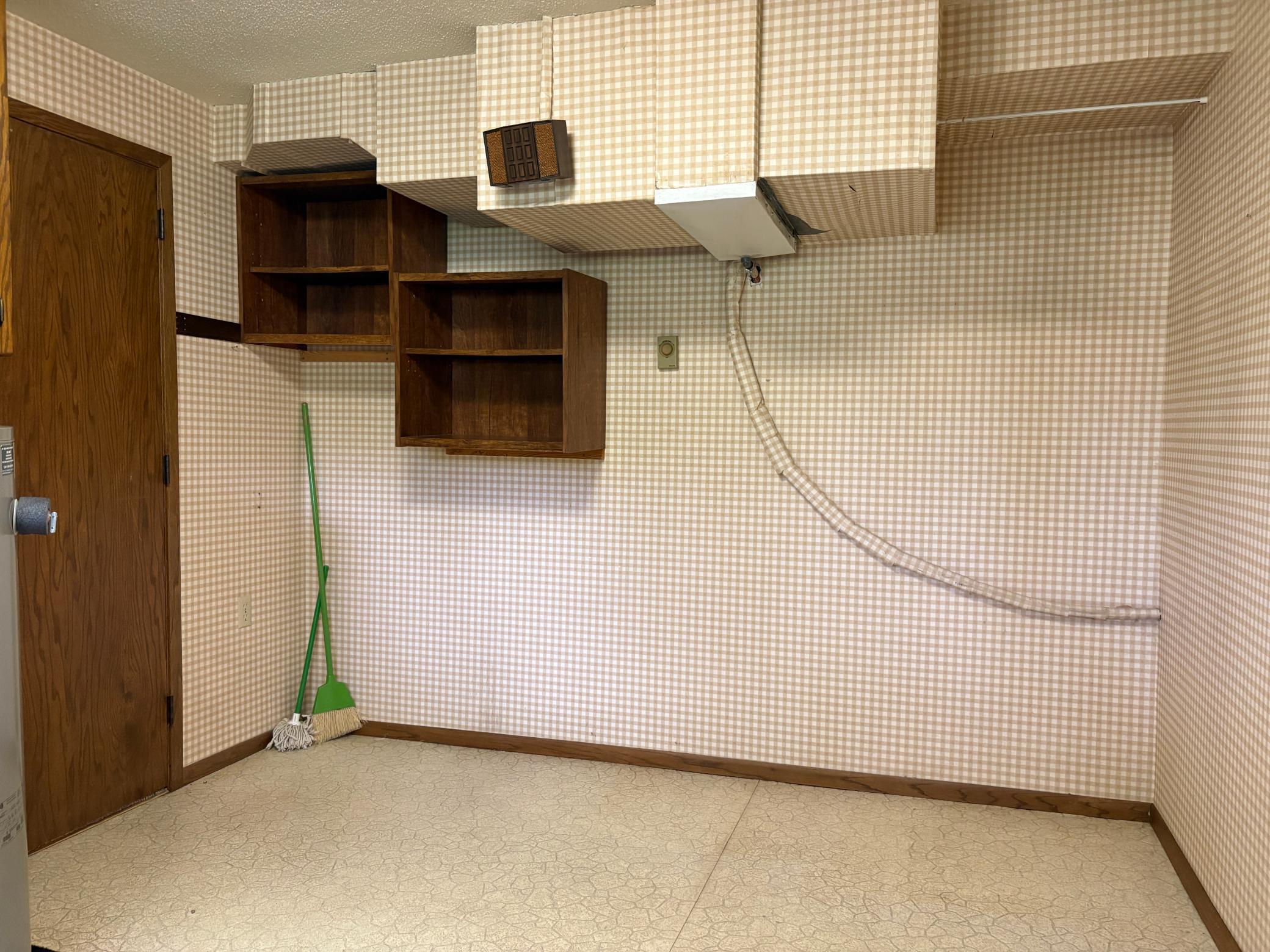 Plenty Of Storage In Laundry Room.JPG