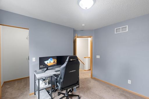 Bedroom two on the upper level is currently being used as an office. It also has a large walk-in closet! *Freshly Painted!*