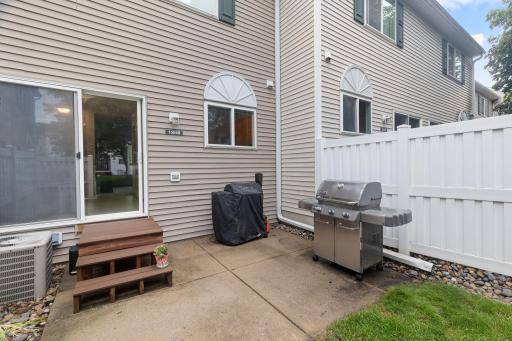 Fire up the grill and enjoy your evenings out here -- wonderful patio with privacy fences. You can still enjoy some green space, without having to mow!