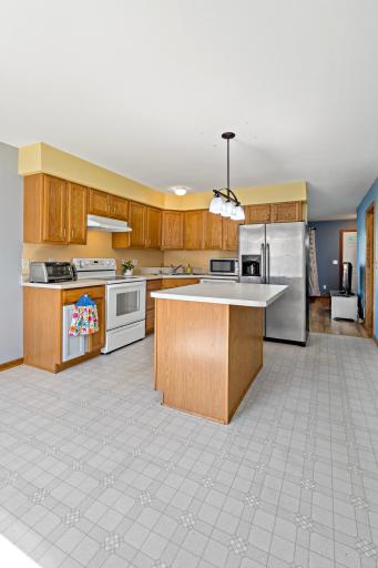 Center Island Kitchen With Ample Cabinets