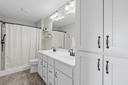 1149 Wyoming St - Primary Private Bath with Double Sinks, New Shower Head, Fixtures, Shelving