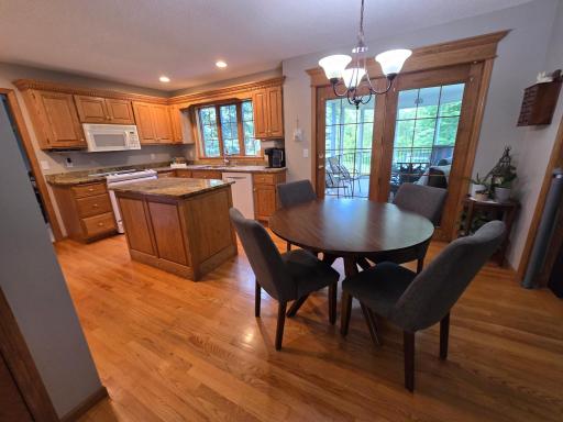 Hardwood floors and granite everywhere. Patio 3 season deck door unit is to the very large deck that has granite floor coverings instead of traditional wood deck boards.