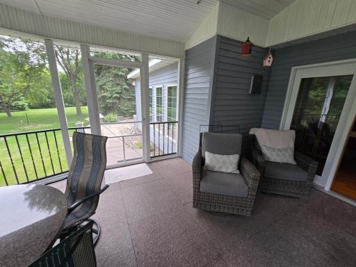 Deck is accessed from the sunken gas fireplace family and gathering room and kitchen with a concrete walk to a sheltered spa hot tub that is full functioning.