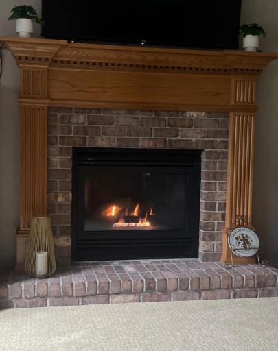 Natural gas fireplace warms your heart as well as your room